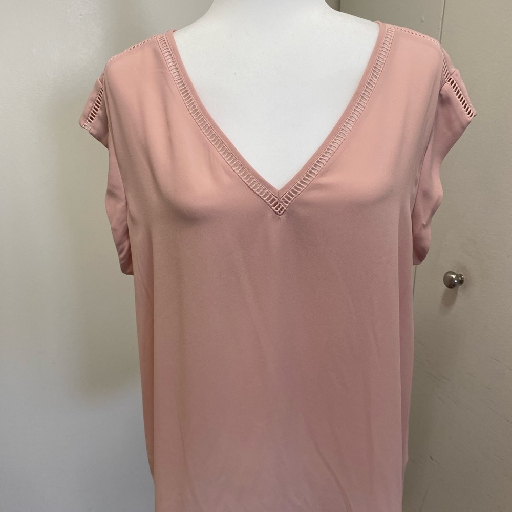Soft pale pink top with lovely detail.